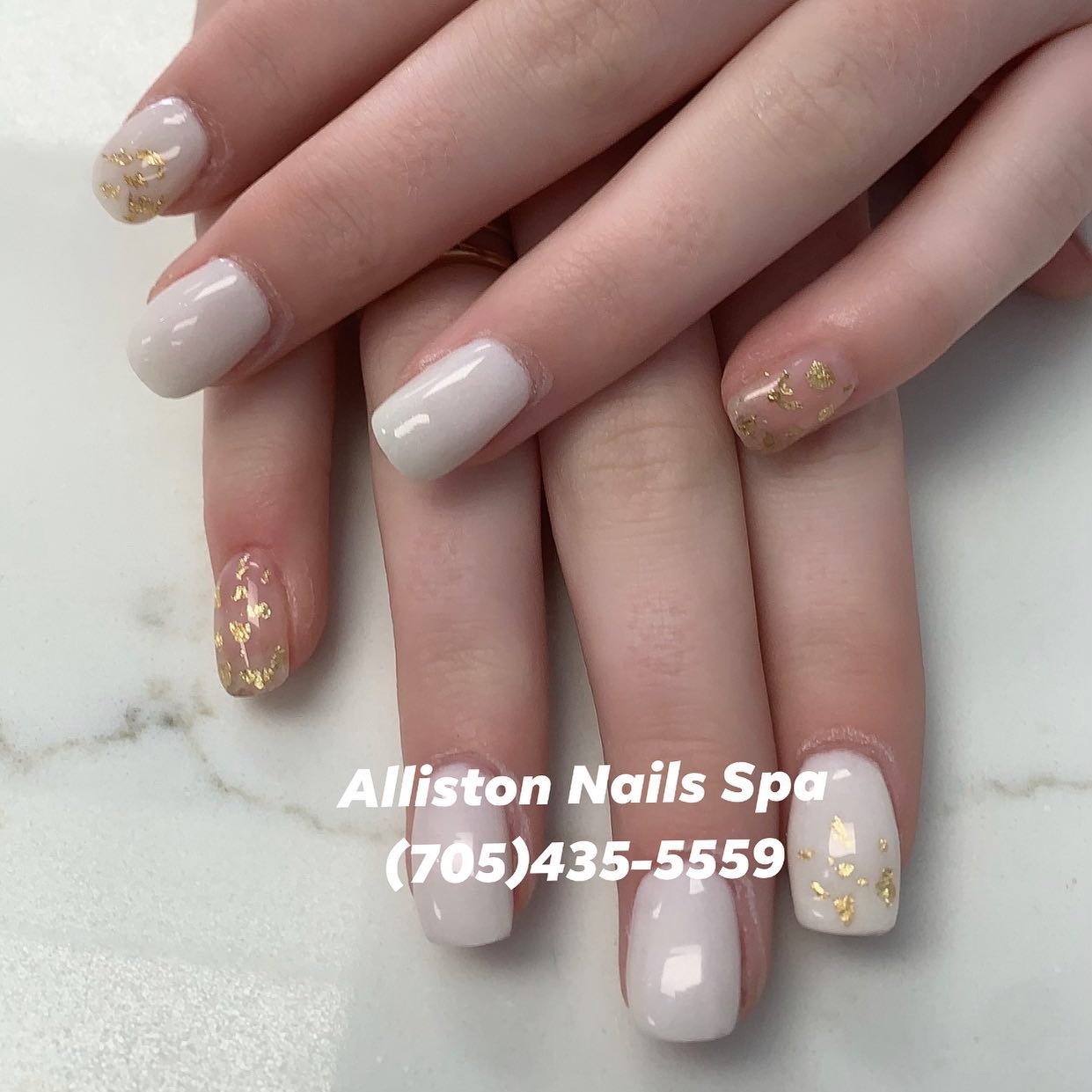Neutral nails with gold foil accents